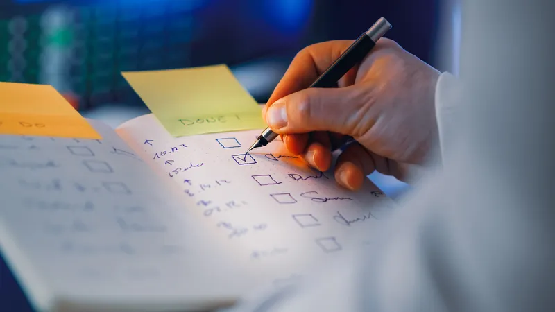 Hand-written checklist for a website maintenance plan template